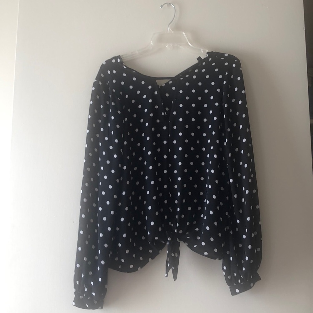 Black blouse with white polka dots